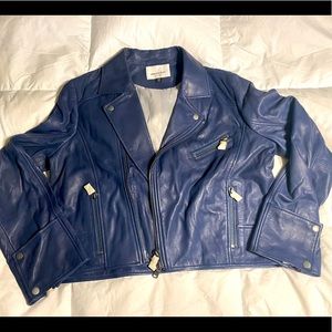 Brand new without tag, zippers are still covered with tissue